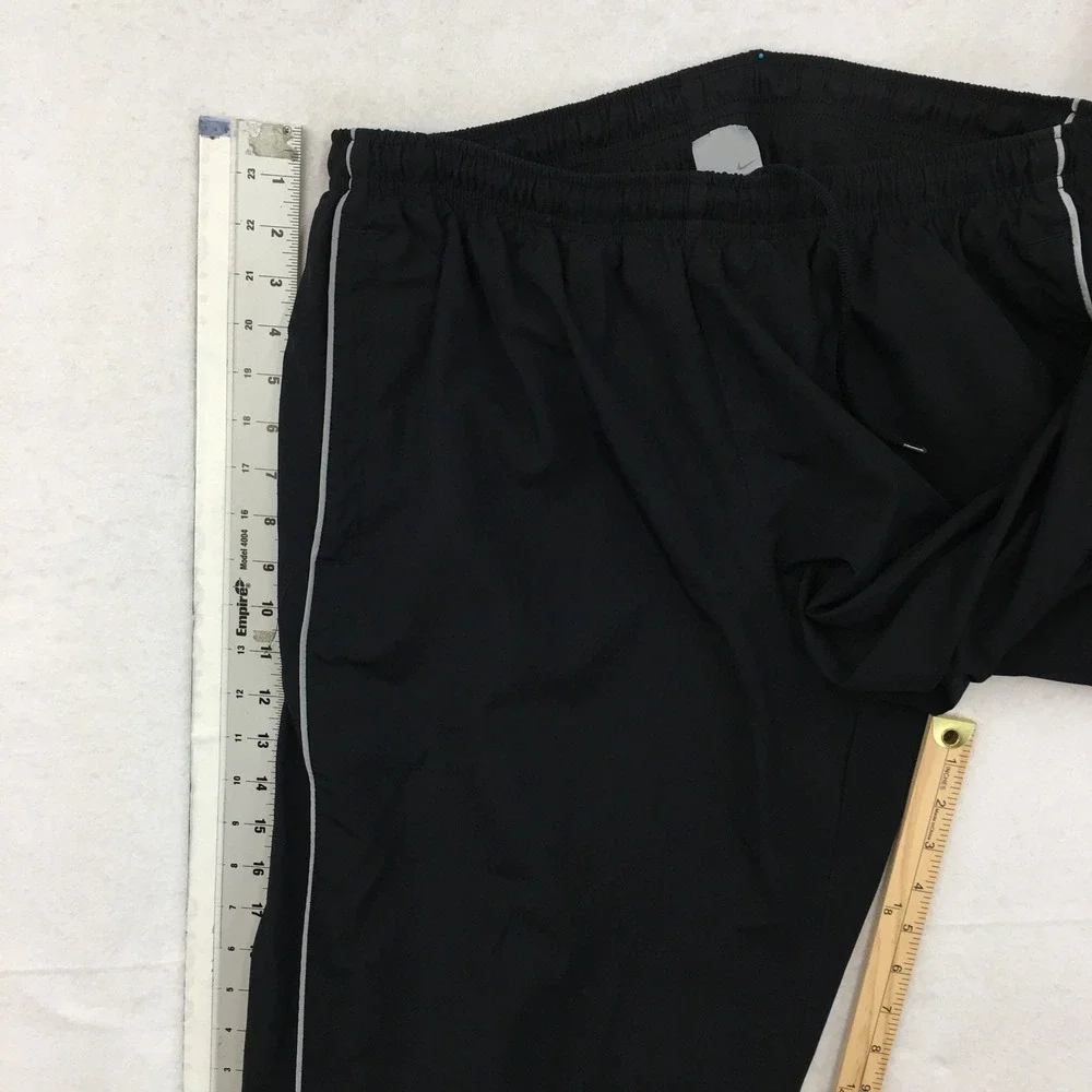 VINTAGE Nike Y2K Mens XL Black Track Pants Swoosh Logo Windbreaker Piping Baggy